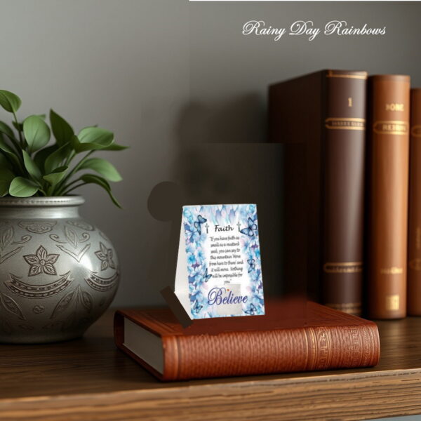 blue flower card on bookcase